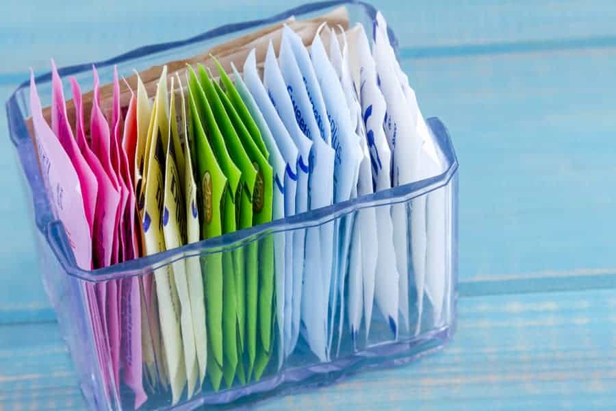 A container filled with Artificial Sweeteners.