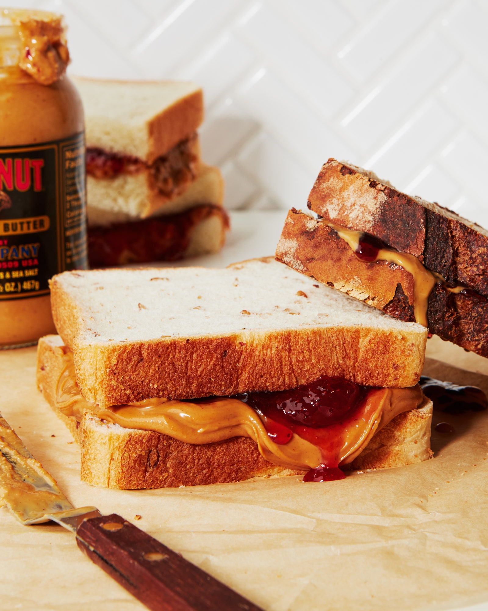 A closeup of peanut butter and jelly sandwiches