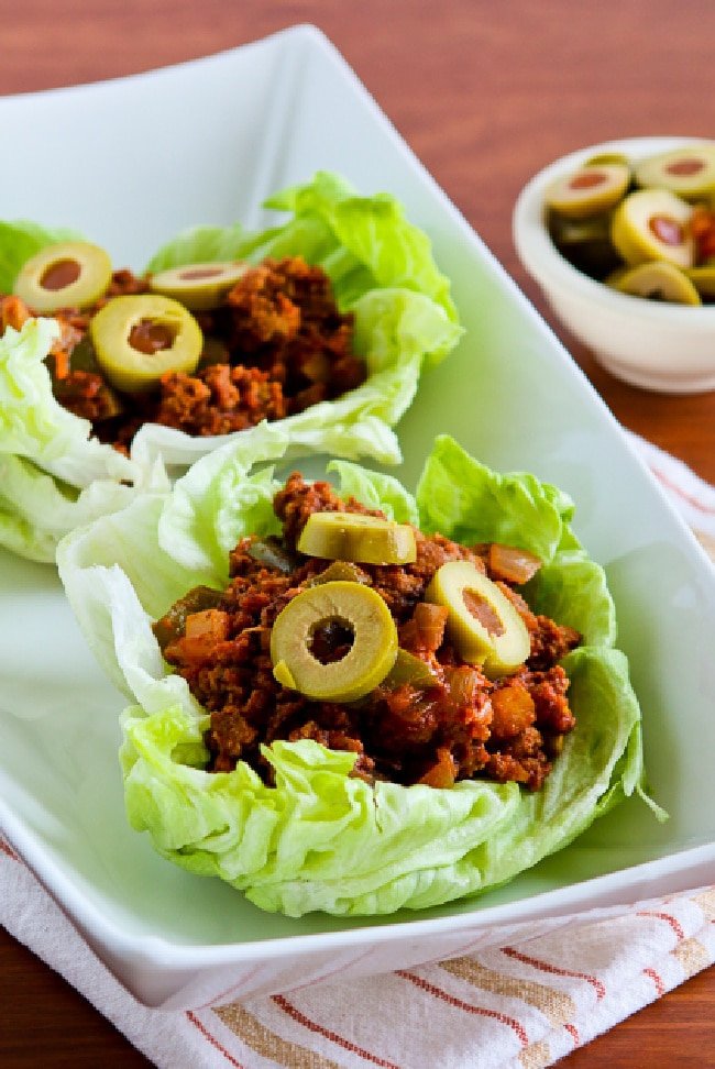 Turkey Picadillo Lettuce Wraps close-up photo of two lettuce wraps in dish