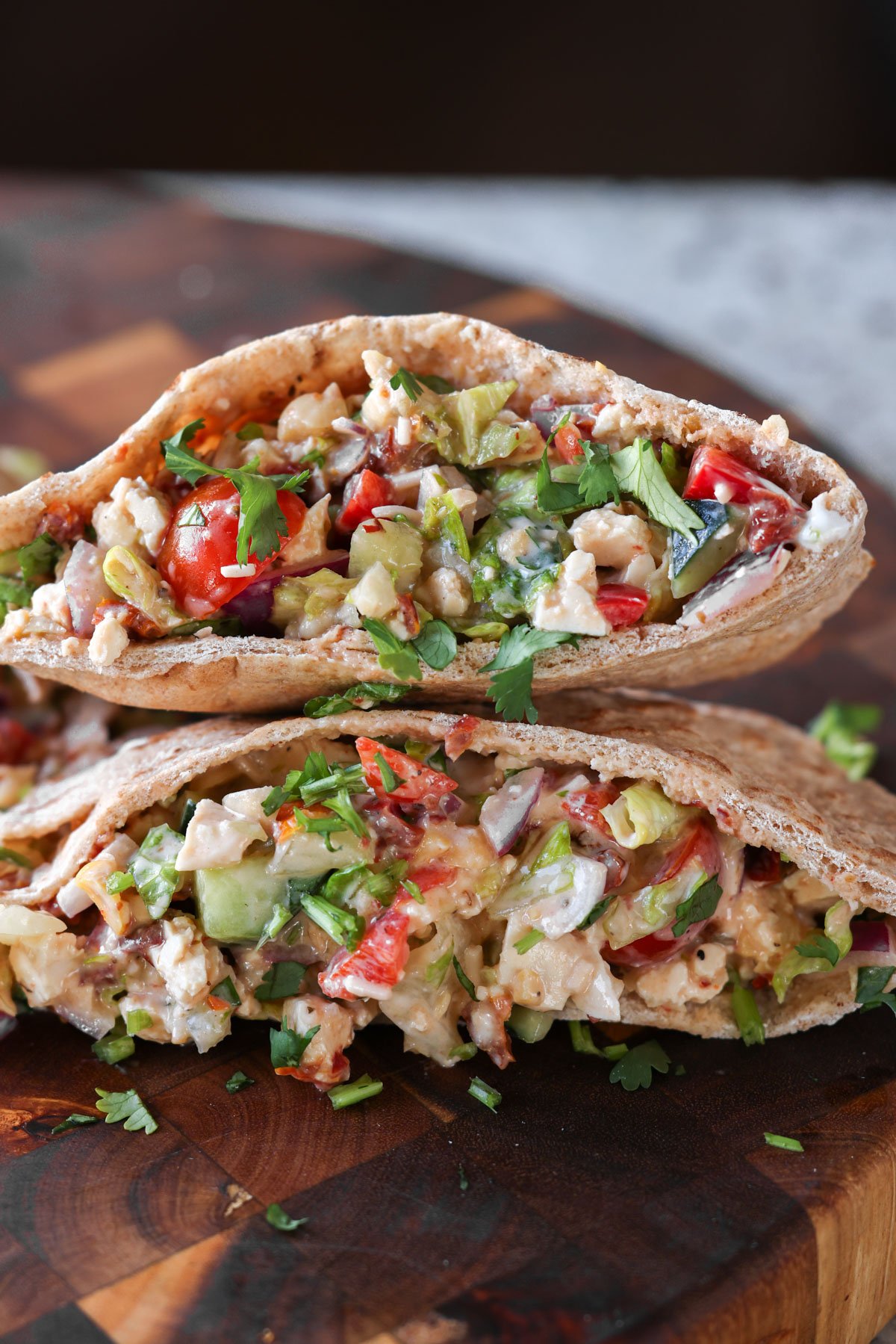 chopped Italian salad sandwich in a pita