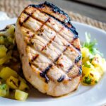 Grilled boneless pork chop with pineapple salsa