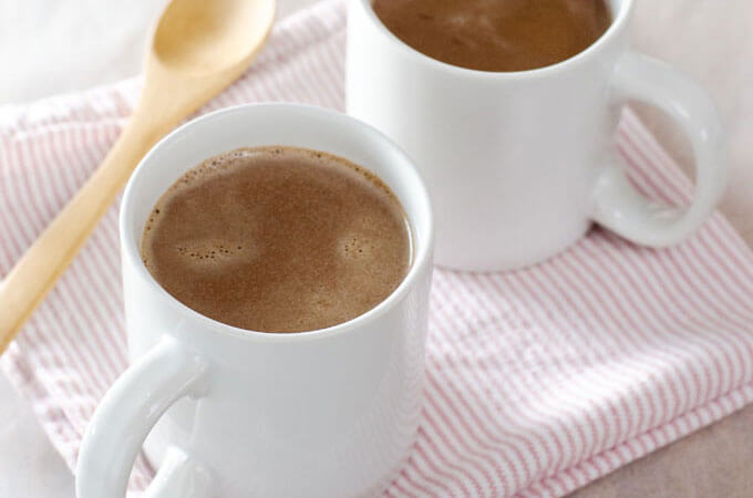 White mugs with hot chocolate