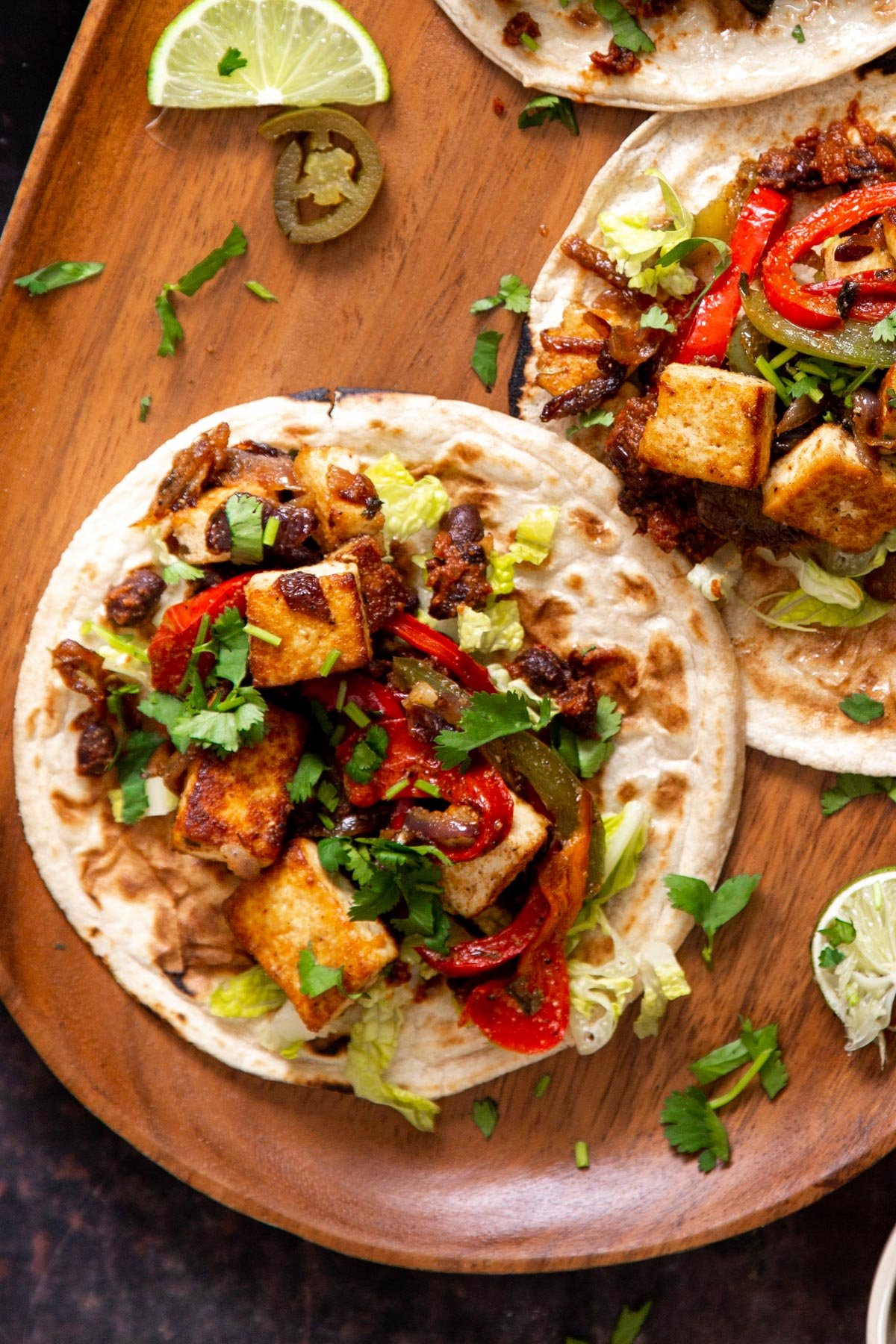 vegan tex mex tofu tacos with bell peppers and fresh cilantro 