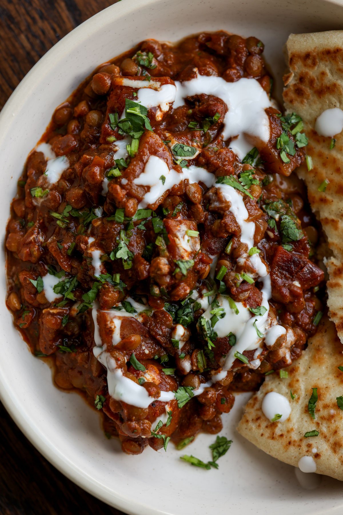 lentils vindaloo in the pan after adding the toppings