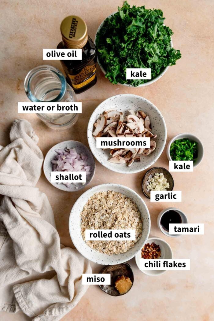 Ingredients for making savory breakfast oats with mushrooms and kale, each labeled.