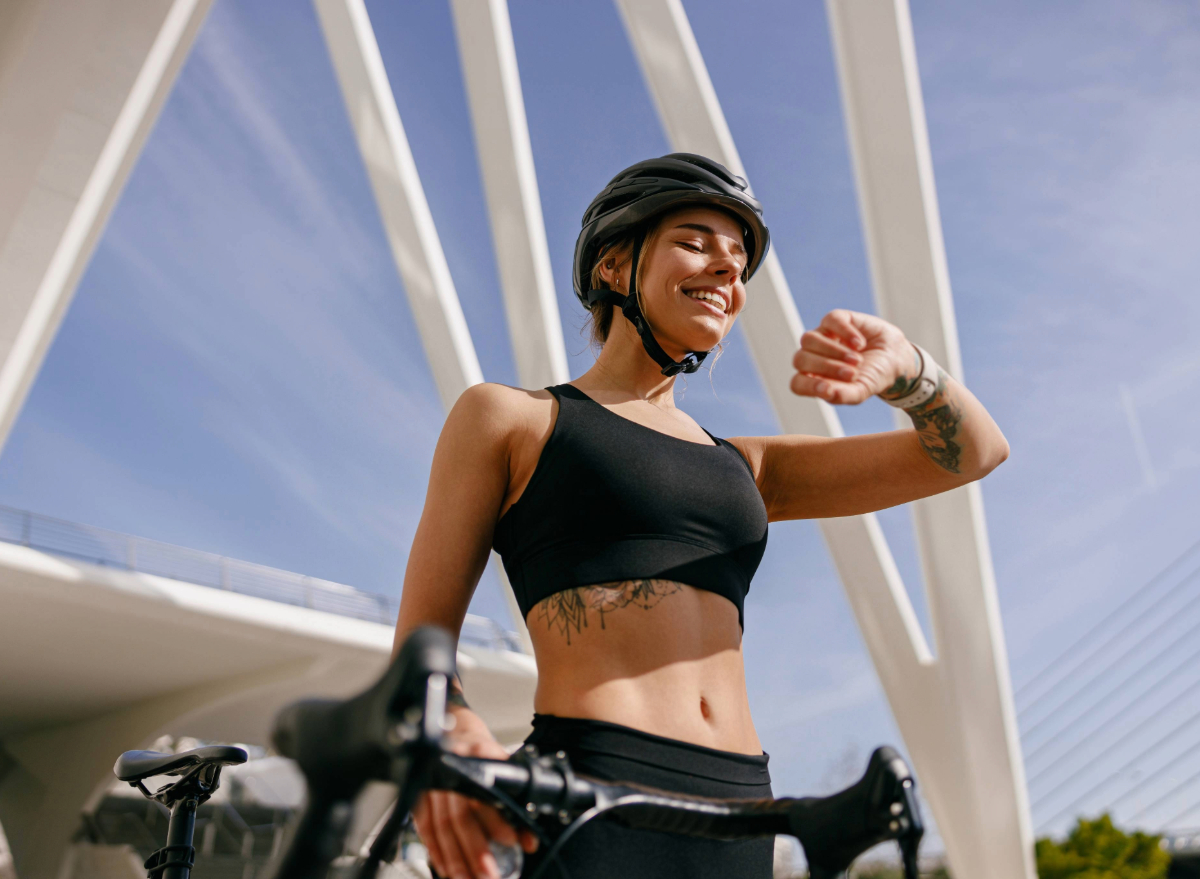 woman checking fitness tracker