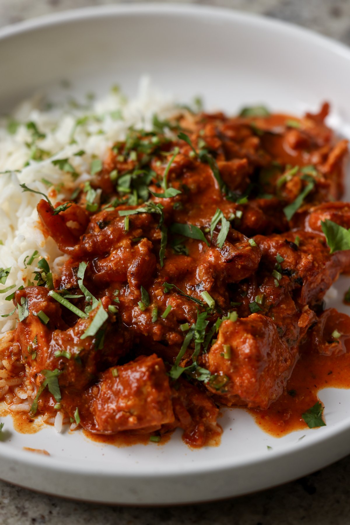 kosha mangsho on a plate with rice