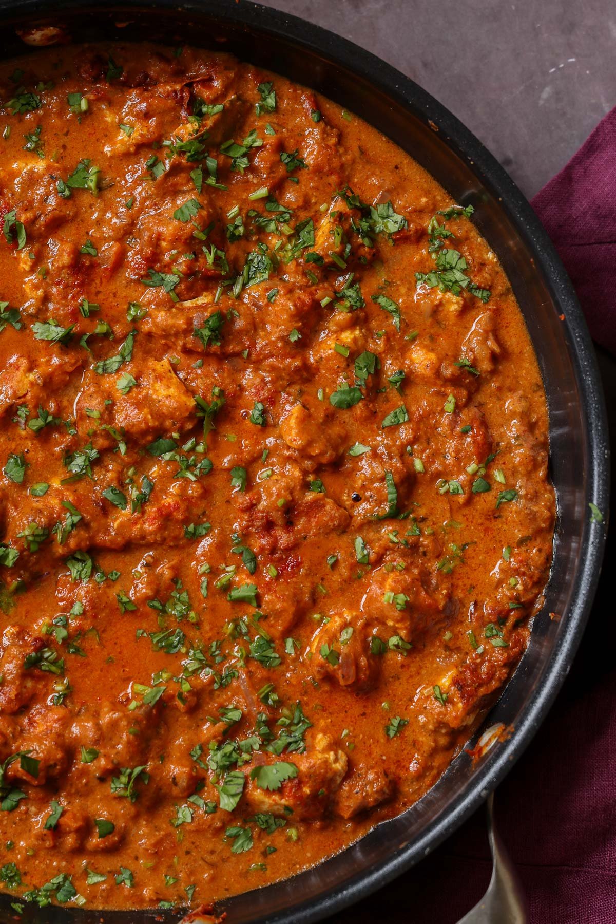 chicken angara in the pan after cooking and adding garnish