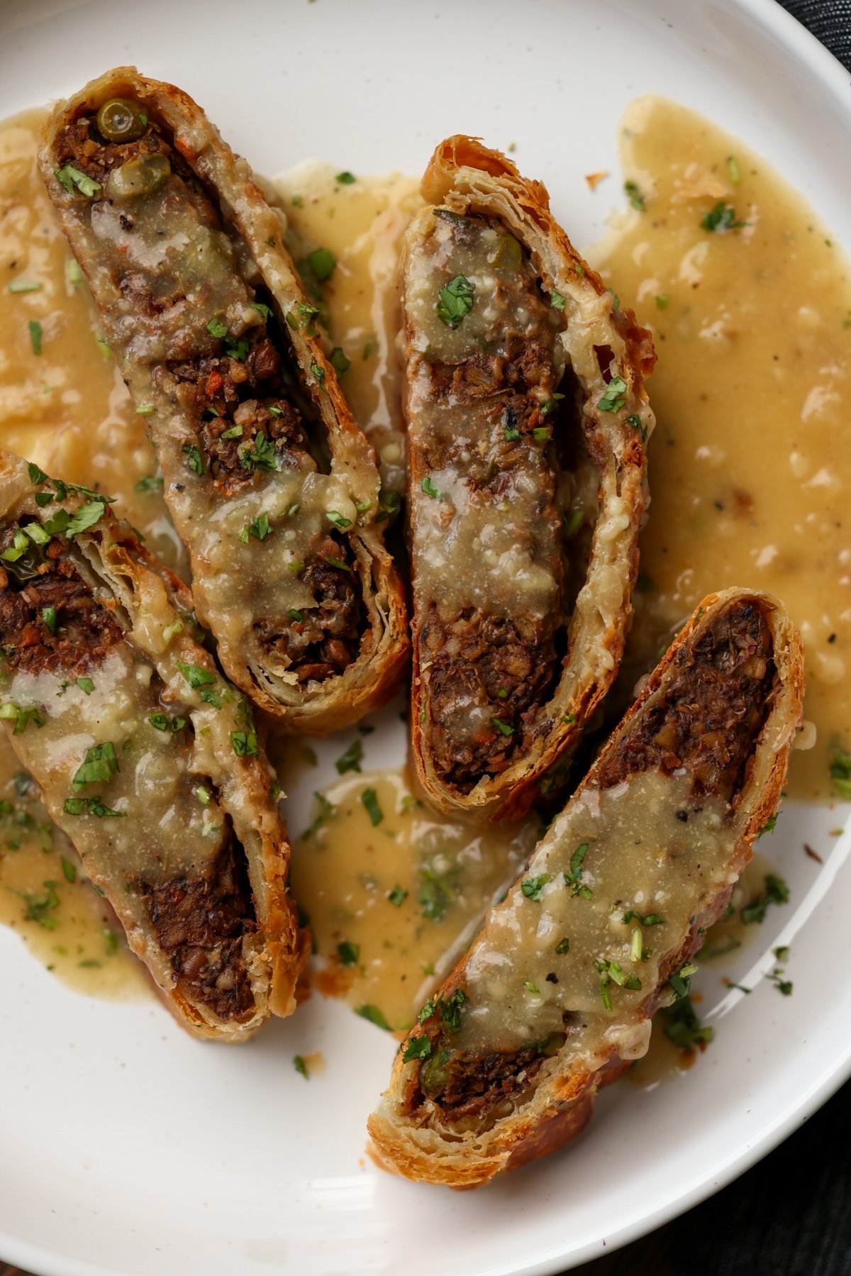 lentil wellington on a plate with gravy