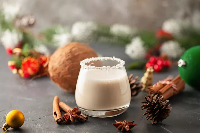 how to make eggnog. A glass of coconut eggnog.