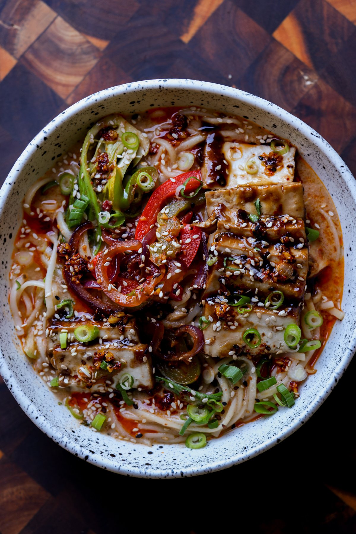 bowl of creamy tahini ramen with teriyaki tofu on top