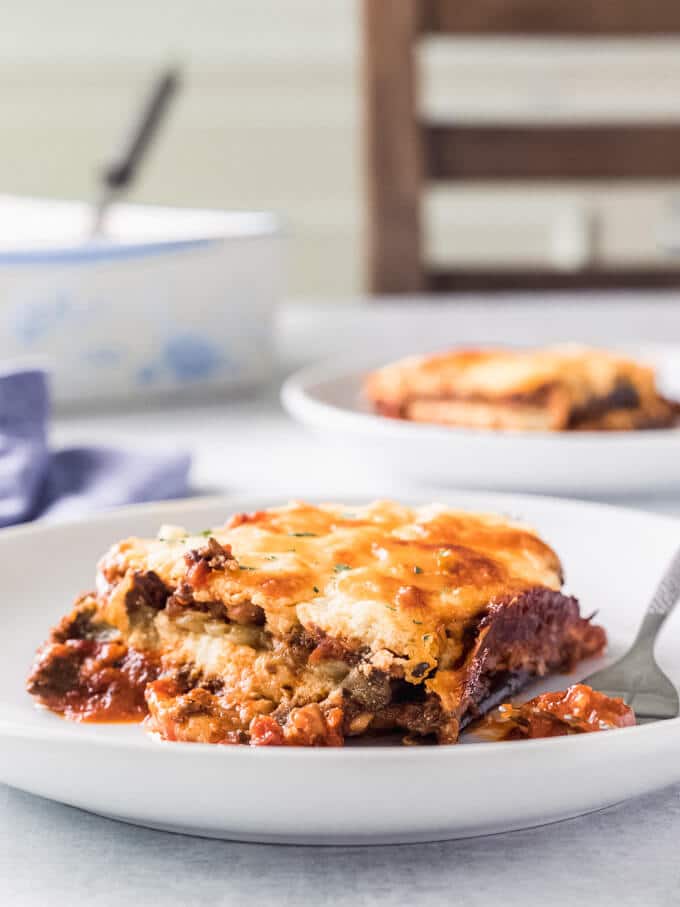 Vegetarian Keto Lasagna with Mushroom Ragu from Low-Carb Maven shown with one serving in front.