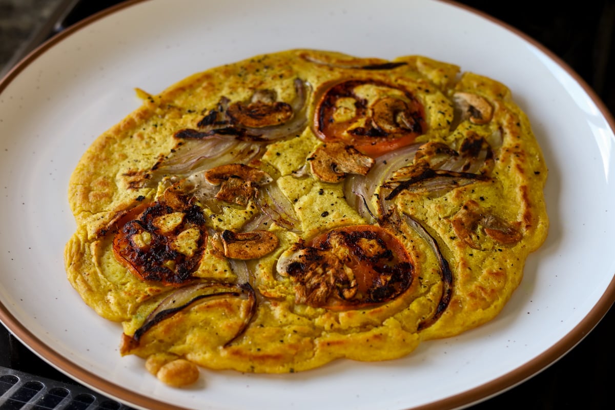 chickpea omelette prepared with veggies